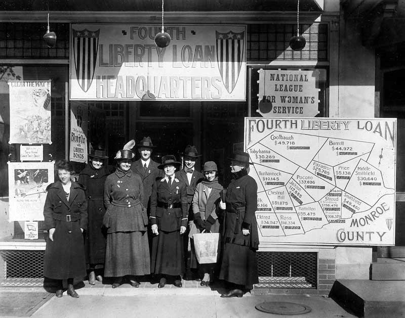 The Monroe County chapter of the National League for Women’s Service spearheaded a drive to sell liberty bonds during World War I. From left: Mrs. Edith Brown, Mrs. Sally Booth, unknown, Rev. Emmons, Mrs. C.B. Staples, Harry Albert, Louise Congdon, and Mrs. Gilbert.