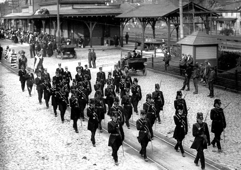 Knights of Malta parade by the East Stroudsburg Railroad Station on Crystal Stsreet, circa 1915.