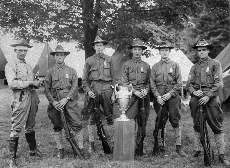 Soldiers celebrate winning a shooting tropy. Earl Kresge is third from right.